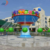 Manège à balançoires en forme de pastèque et chaise volante, équipement de parc d'attractions rotatif pour enfants