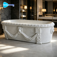 Baignoire ovale autoportante en marbre massif, sculptée à la main, moderne et élégante, durable, pour une utilisation en salle de bain intérieure