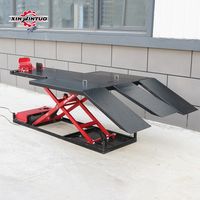 Ascenseur de cycle de moteur électrique fiable de Xinjintuo ascenseur de moto de garage de plafond bas