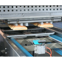 Machine industrielle automatique en acier inoxydable pour le démoulage continu de pains à hamburger, pains à hot-dog et pains de boulangerie - Nouveauté