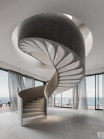 Escalier intérieur courbé artistique de luxe en promotion avec éclairage LED, marches en marbre et bois, et garde-corps en verre pour villa