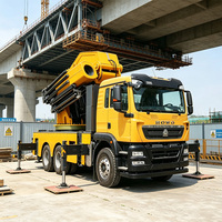 Grue de camion à bras articulé hydraulique 80000 kg, masse totale 33000 kg, portée des stabilisateurs 19 m, pression de service 30 MPa, grue de camion pour charges lourdes