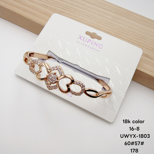 Bracelet jonc tendance pour femme XUPING, en cuivre plaqué or, orné de zircons cubiques synthétiques, vente en gros - Product Image 6