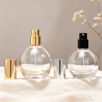 Flacon pulvérisateur de parfum sphérique en verre transparent 30ml 50ml 75ml 100ml vide avec impression personnalisée du logo pour emballage de parfum