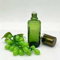 Nouvelle arrivée, flacon cosmétique en verre vert haut de gamme avec bouchon et compte-gouttes électro-plaqué, flacon en verre pour sérum