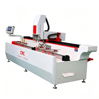Machine de perçage et de fraisage CNC à double broche et tête pivotante pour cadres de portes et fenêtres en bois massif