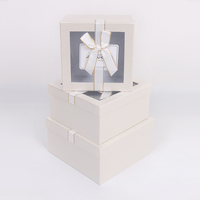 Boîte cadeau de luxe carrée en carton avec fenêtre transparente, double ruban et nœud, logo personnalisé, gaufrage et pelliculage mat – Offre Spéciale