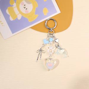 Porte-clés en alliage simple et élégant en forme de nœud, en résine tridimensionnelle en forme de cœur, pour téléphone portable ou sac - Product Image 5