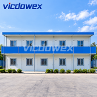 VICDOWEX Maison préfabriquée de luxe en forme de T personnalisée avec panneaux en acier et sandwich pour bureau de chantier et logement à long terme