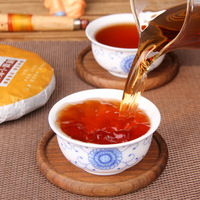 Thé Pu'er mûr du Yunnan avec un arôme de date vieilli durable - Gâteau de petit tribut Menghai en gros