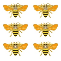 Anneau de serviette en alliage jaune motif petite abeille pour la décoration de tables d'hôtel, mariages, banquets et événements festifs (vente en gros)
