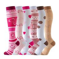 Chaussettes de compression sportives personnalisées en gros pour femmes, respirantes, séchage rapide, hauteur genou, avec logo sur le dessous, collection Printemps