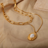 Collier chic vintage plaqué or à double rangs de chaînes, pendentif ovale imitation perle texturée, en acier inoxydable