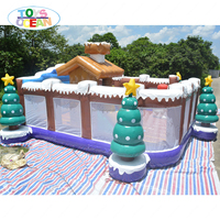 Parc de jeux gonflable de Noël en forme de cabane d'hiver, maison de jeu gonflable à thème de Noël pour enfants avec toboggan pour fêtes et divertissements