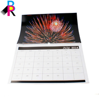 Nouveau modèle de calendrier mural en papier style vintage avec cadre photo et reliure spirale, produit transfrontalier très vendu, idéal pour le commerce centralisé et comme cadeau.