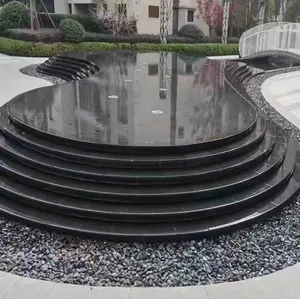 काले ग्रेनाइट स्मारक नक्काशीदार उद्यान जल सुविधा पत्थर ग्रेनाइट टॉम्बस्टोन के आकार का प्रसंस्करण अनुकूलित