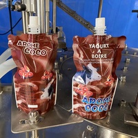Machine automatique pneumatique de remplissage, scellage et bouchage pour sachets à bec verseur et sacs à jus, avec engrenages et roulements