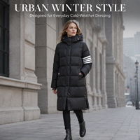 Manteau matelassé en duvet pour femme Signature, 90 % duvet de canard blanc, manches rayées, fentes latérales, idéal pour les événements du soir et les trajets quotidiens