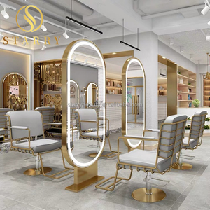 Miroir de coiffure ovale de luxe moderne et durable en fer avec éclairage LED et cadre doré pour hôtels et supermarchés - Product Image 5