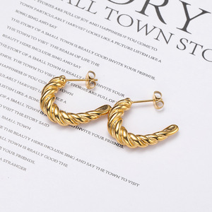 Nuevos pendientes de acero de titanio giratorios de tendencia INS japoneses y coreanos para mujeres simples todo pequeño bastón en forma de caramelo - Product Image 1