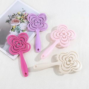 หวีจัดแต่งทรงผมแบบเปียกและแห้ง ใช้ได้สองแบบ ช่วยเพิ่มวอลลุ่ม ทรงกลม ปลายหวีแบบเข็ม แผ่นหลังโปร่ง รูปทรงใบโคลเวอร์สี่แฉก - Product Image 1