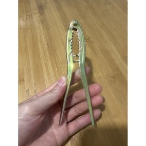 Casse-noix en acier inoxydable de forme irrégulière 63g, outil de décorticage en plastique pour fruits secs - Product Image 1