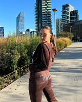 Ventes en gros de costumes décontractés pour femmes de style millénaire, vêtements de rue, mode rétro, coupe régulière, ensembles à capuche, combinaison à fermeture éclair