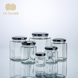 wholesale cheap hexagon food storage honey empty glass jar for canning with lid