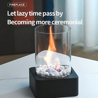 Cheminée de table carrée en métal noir créatif avec dessus en verre de pierres décoratives en acier inoxydable durable