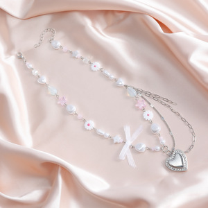 Dopamina corazón colgante nicho dulce bosque estilo clavícula cadena Xiaohongshu Bowknot collar mujeres al por mayor - Product Image 1