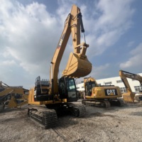 Prix abordable : Excavatrice sur chenilles CAT 320E d'occasion, 20000 kg, pour travaux de terrassement de taille moyenne, avec châssis à chenilles d'origine durable