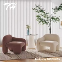 Fauteuil simple de style nordique avec un design simple et créatif, mobilier de salle à manger et de loisirs pour hôtel, fauteuil moderne en tissu pour salon