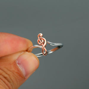 Bague tendance F1605 en acier inoxydable plaqué or rose, design note de musique, bijou unisexe, cadeau - Product Image 1