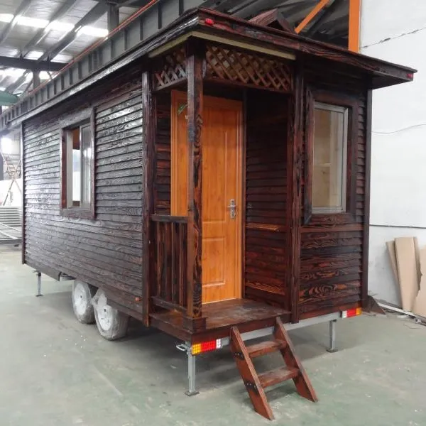 Prefabricated hotel convenient RV residence uses steel structure wooden house travel trailer