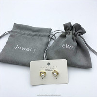 Argent estampage daim cadeau cordon sac bijoux boucle d'oreille sac de rangement Faux daim pochette pour bijoux/montre/lunettes/rasoir