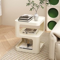 Table basse minimaliste moderne en fer avec plateau en verre et étagère de rangement pour chambre et salon