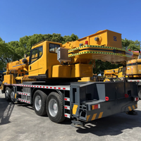 Grue hydraulique sur camion de 55 tonnes QY55KC, hauteur de levage de 60,3 m, flèche principale en forme de U, grue mobile pour la construction, en vente