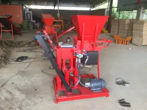 Máquina de fabricación de ladrillos de hormigón de bloque de colocación de cemento hueco de suelo vibratorio diésel pequeño Manual de Australia