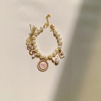 Collier pour animaux de compagnie en perles tendance avec clochette pour chats et petits chiens, accessoires élégants pour animaux de compagnie