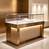 Table de présentation de bijoux de luxe moderne avec éclairage LED, construction durable en verre et bois, design facile à nettoyer pour les magasins de détail