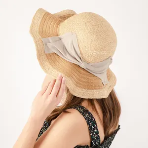 Commercio all'ingrosso nuovo quotidiano elegante rafia paglia e treccia di carta cappello secchio cappello con tesa ondulata per le donne