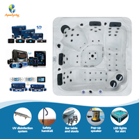 Jacuzzi extérieur moderne pour 5 personnes, autoportant, avec coque en acrylique, 65 jets hydromassants, contrôle Balboa, idéal pour les projets de villas et de jardins.