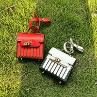 Sac de rangement haut de gamme en cuir PU pour écouteurs, avec pendentif pompon et mini pendentif clé Kelly Charter mignon pour femme