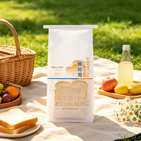 Pochette à fond plat scellée sur huit côtés, imprimée sur mesure, en PET, papier, CPP, avec fenêtre transparente de qualité alimentaire pour l'emballage de pain de mie, de produits de boulangerie et d'aliments.