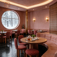 Ensemble de mobilier moderne pour café, restaurant, hôtel, cafétéria : banquette en cuir orange clair, chaise en tissu à pois, table en bois