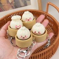 2026 New Design Creative Fashion Cute Steamed Button Bun Steamer Keychain Stress Relief Toy Backpack Charm Promotion Gift