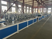 Machine automatique de découpe et de perforation pour la fabrication de protège-coins en carton