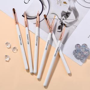 Kit de pinceles para <span class=keywords><strong>uñas</strong></span>, mango de madera blanca y dorada, delineador acrílico 3D japonés de pelo de nailon Popular para redes sociales, <span class=keywords><strong>2022</strong></span> - Product Image 4