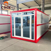 Cbox Maison Conteneur Modulaire Pliable avec Porte Vitrée à Cadre Rouge pour Bureau, Logement ou Site de Chantier