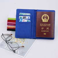 Fabriqué en usine plaine mignon PU cuir passeport couverture Sublimation Airtag passeport titulaire pour carte de visite Style de mode